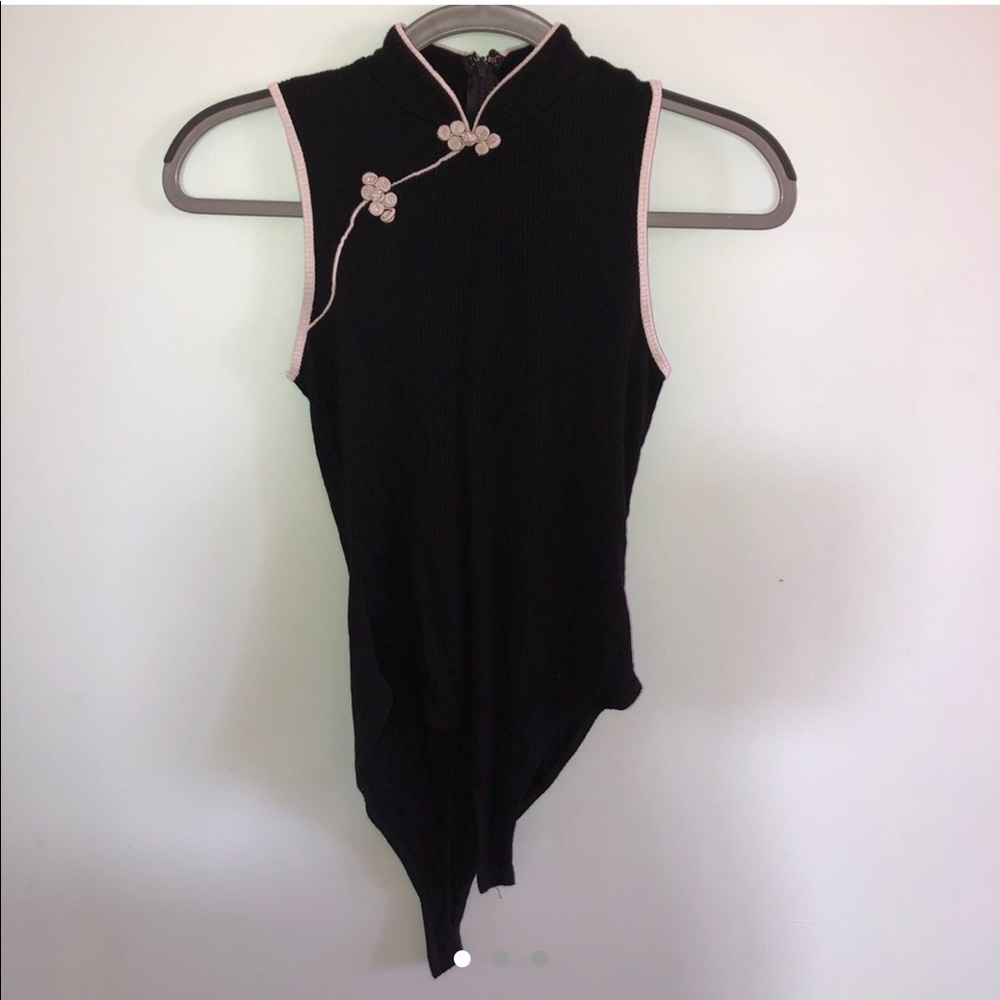 Darling oriental style ribbed bodysuit.